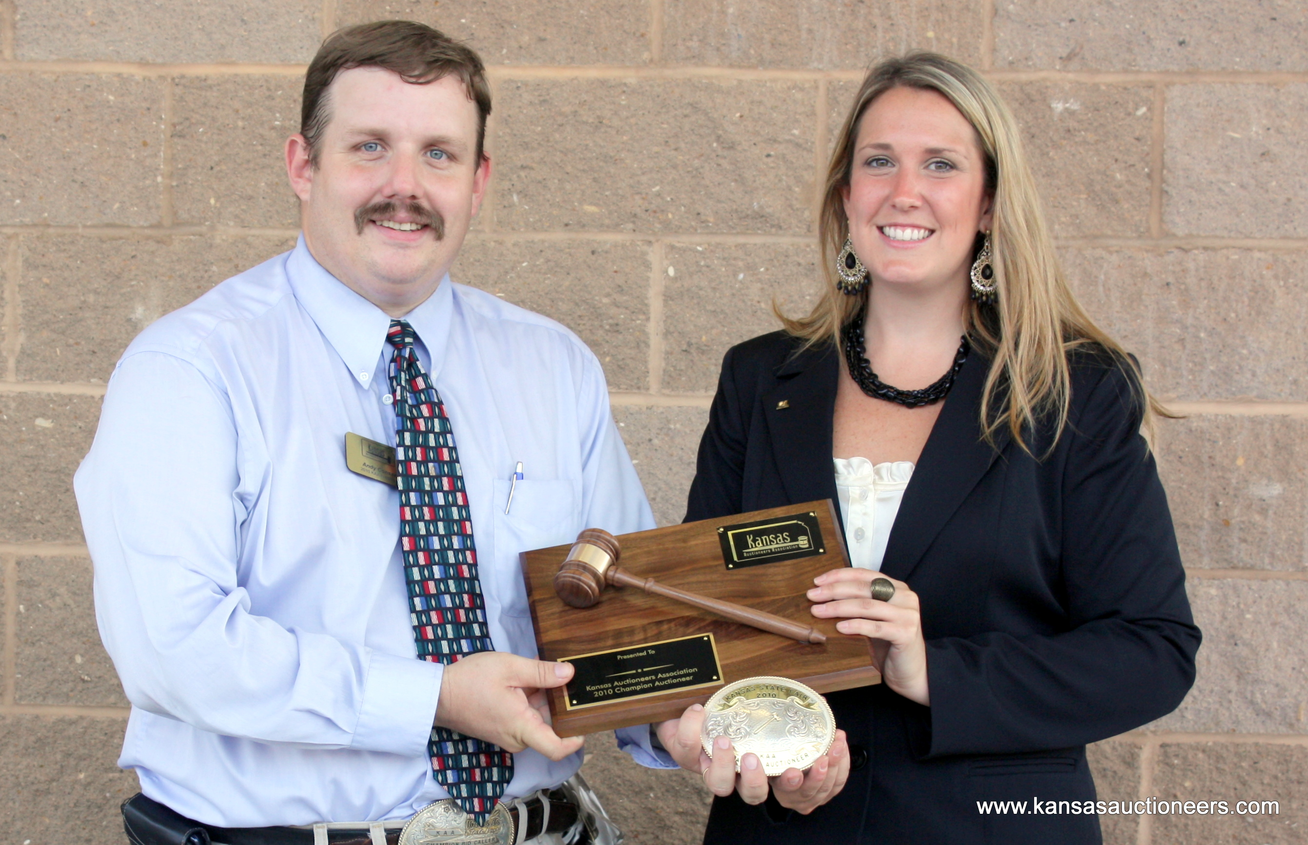President Andy Conser presents championship plaque and buckle to Megan McCurdy